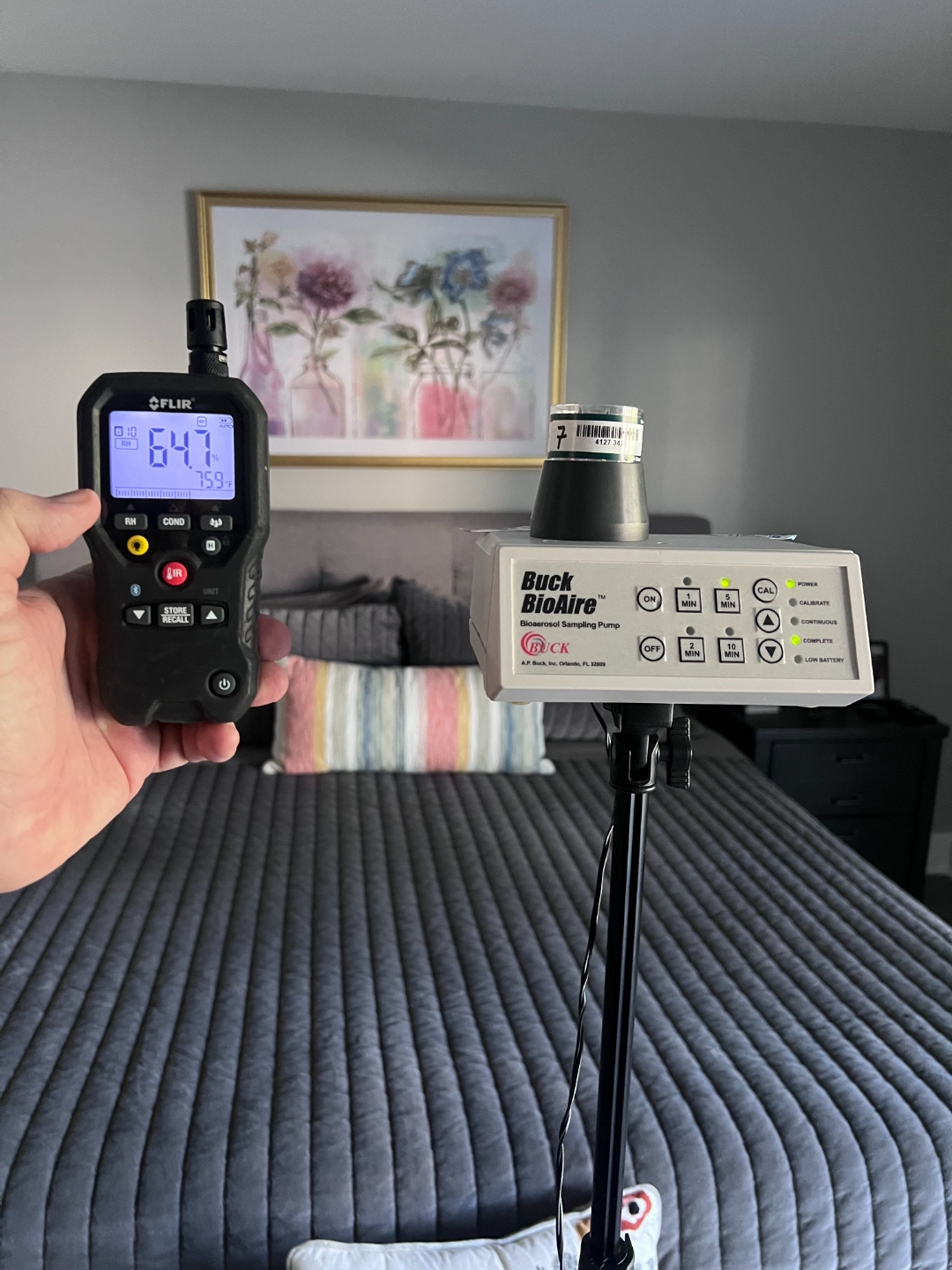 Buck BioAire bioaerosol sampling pump and FLIR meter used for mold air quality testing