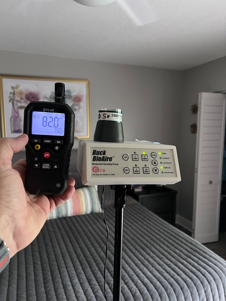 Bioaerosol air pump collecting mold spore sample in Hialeah, FL