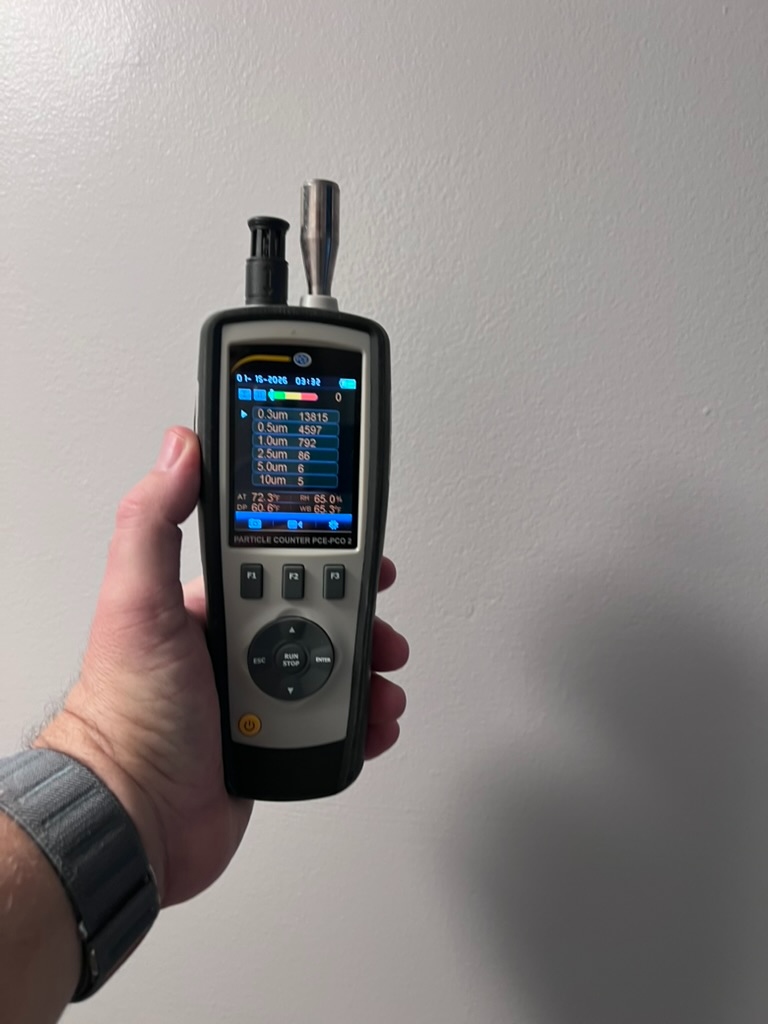 Particle counter measuring airborne particle concentration in Hialeah home