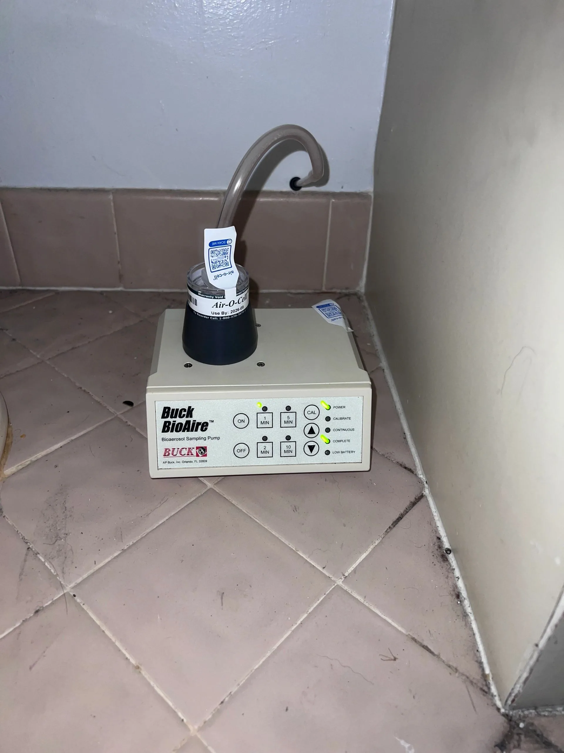 Inspector checking moisture levels