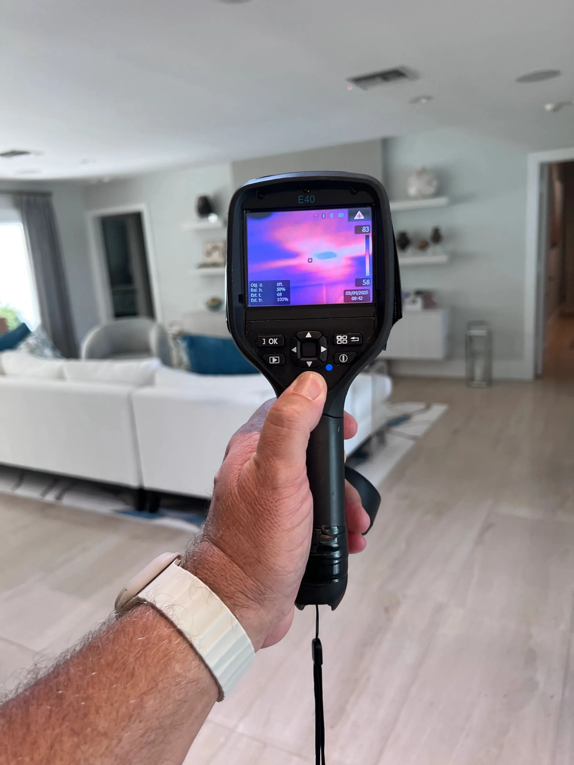Home Enviro mold inspection equipment positioned for air sampling in a residential property