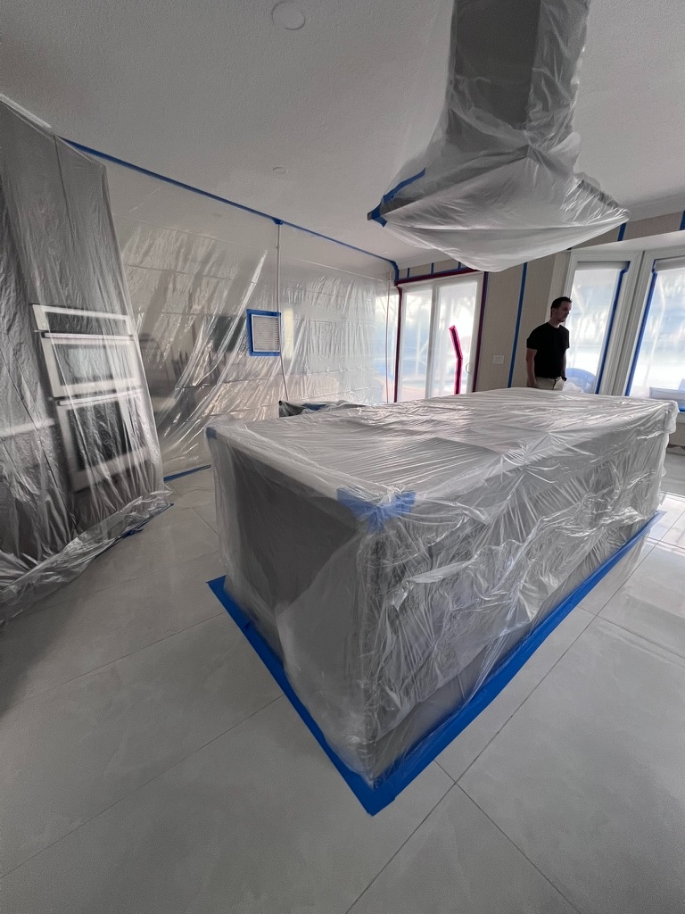 Licensed mold assessor overseeing large open area containment setup