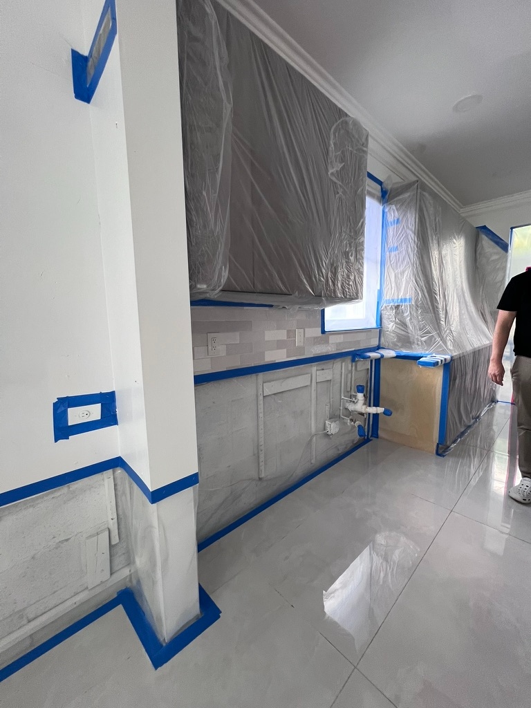 Kitchen area containment with protected cabinets during mold remediation