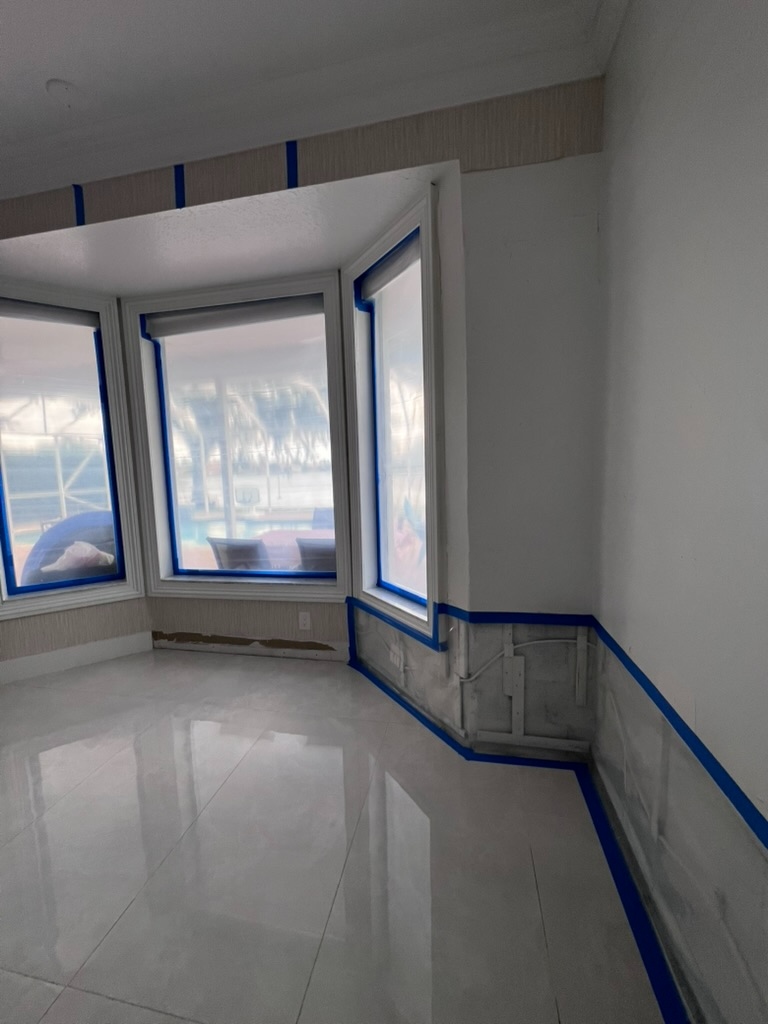 Bay window room sealed with containment plastic for post remediation inspection