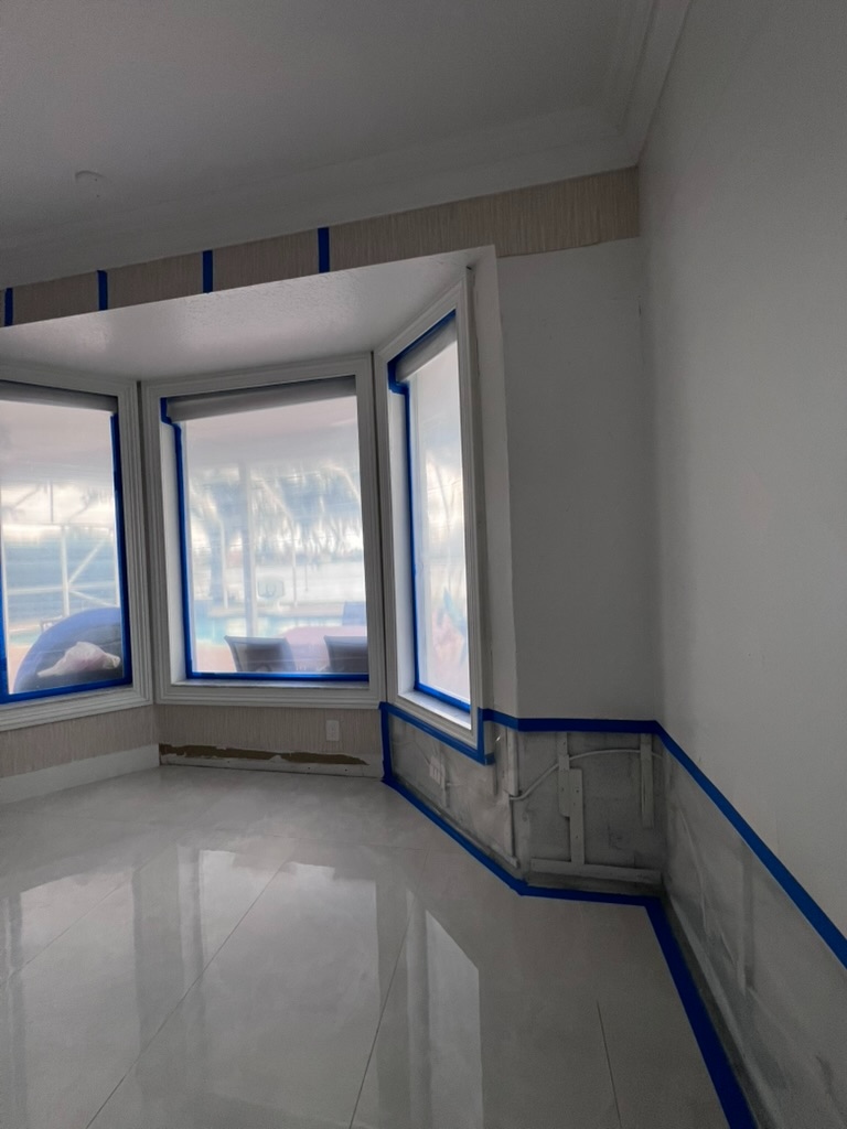 Remediation containment enclosure in bedroom with bay windows